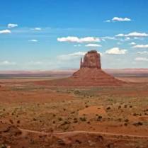 A sweeping view of the famous "Mittens" formations in Monument Valley Arizona.